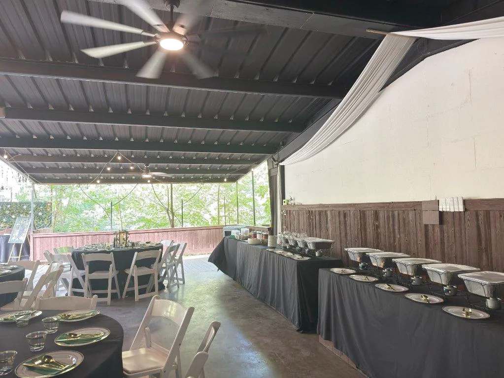 Catering buffet with serving tables set up for an event