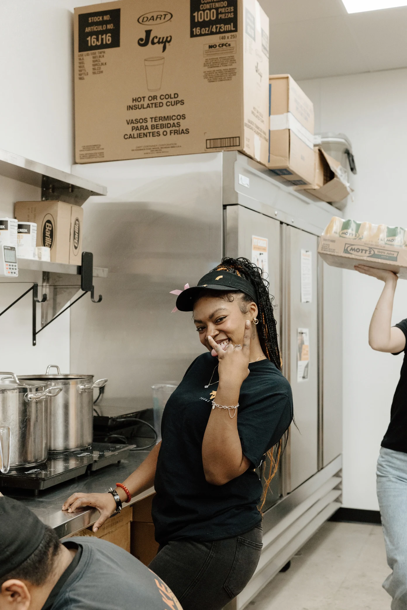 A Roni’s team member smiling in the kitchen